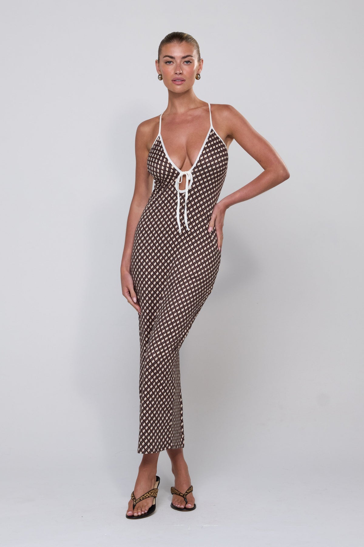 This is an image of Sophia Dress in Tulum - RESA featuring a model wearing the dress
