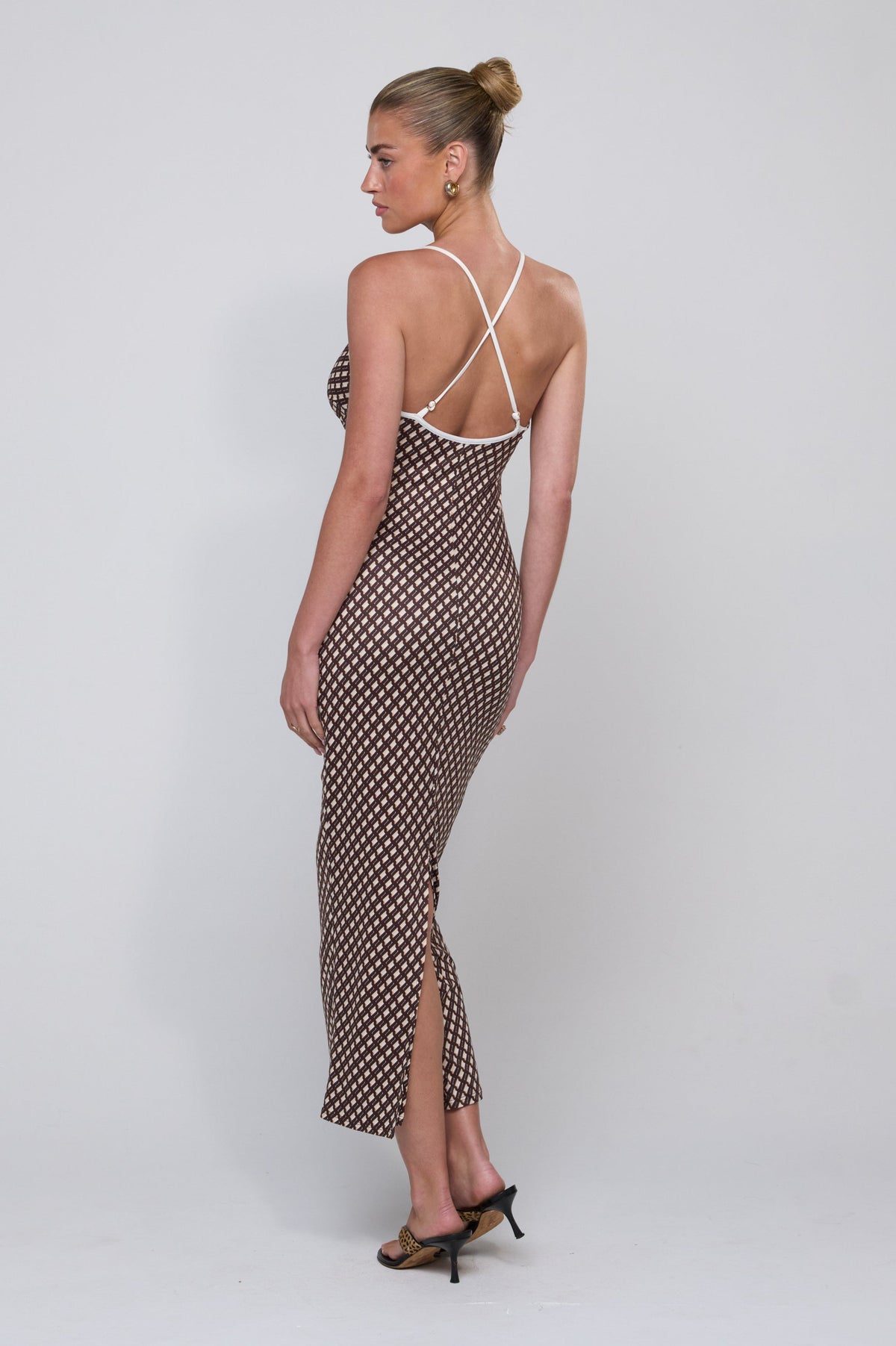 This is an image of Sophia Dress in Tulum - RESA featuring a model wearing the dress