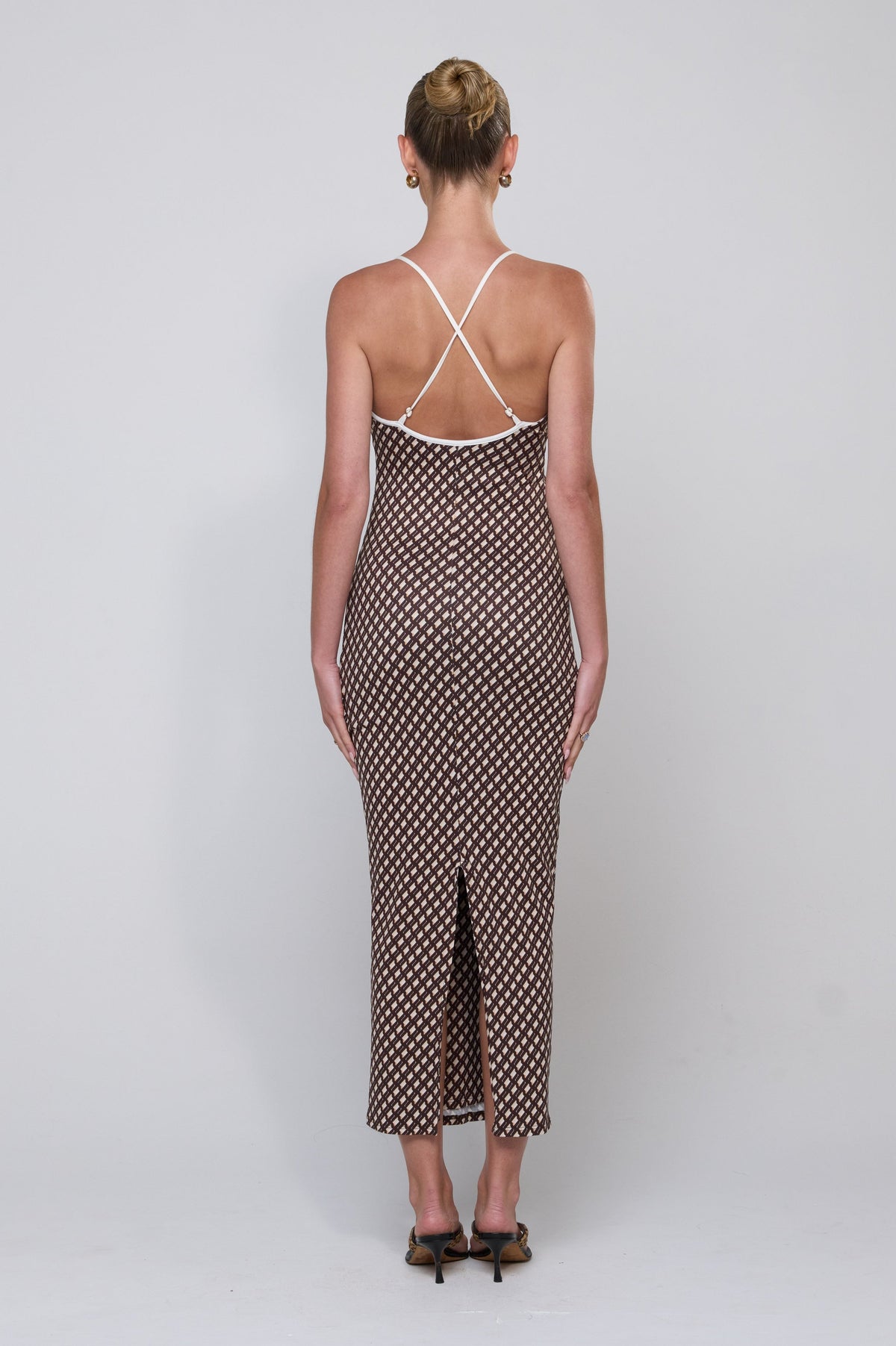 This is an image of Sophia Dress in Tulum - RESA featuring a model wearing the dress
