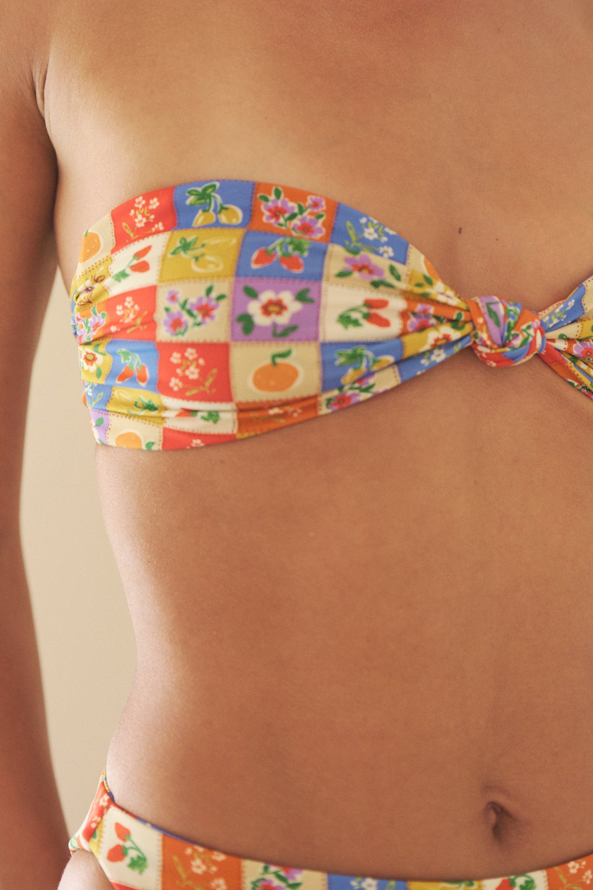 This is an image of Spencer Bikini Top in Picnic - RESA featuring a model wearing the dress