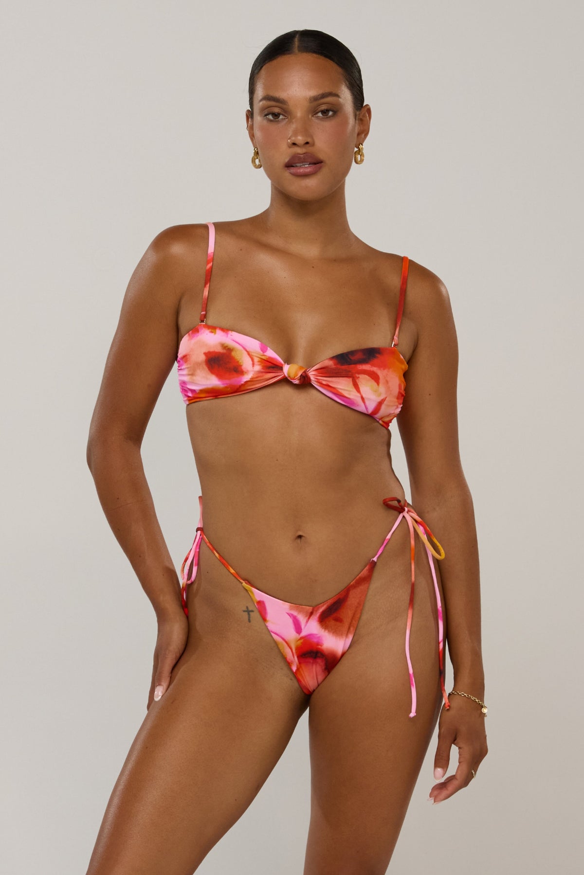This is an image of Spencer in Lilikoi - RESA featuring a model wearing the dress