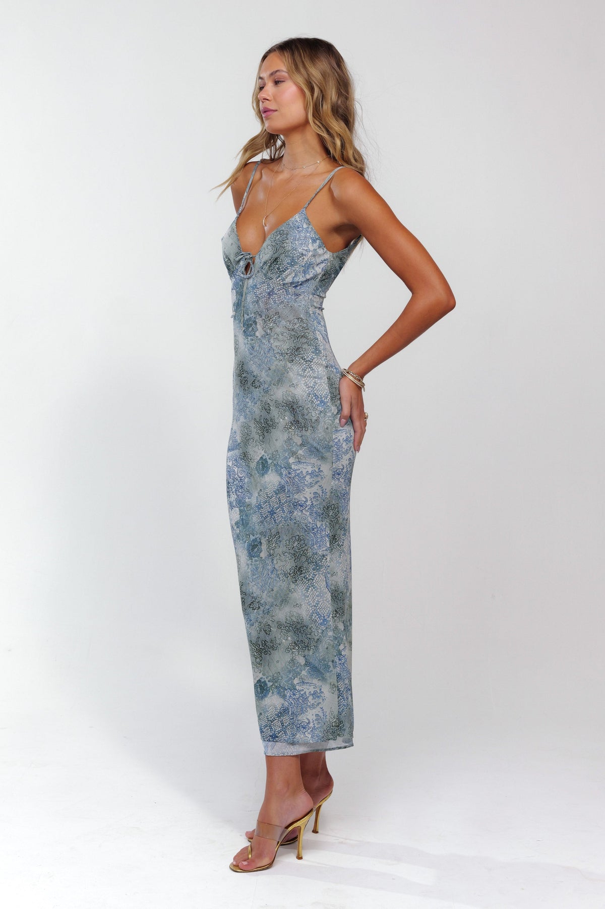 This is an image of Suki Dress in Siren - RESA featuring a model wearing the dress