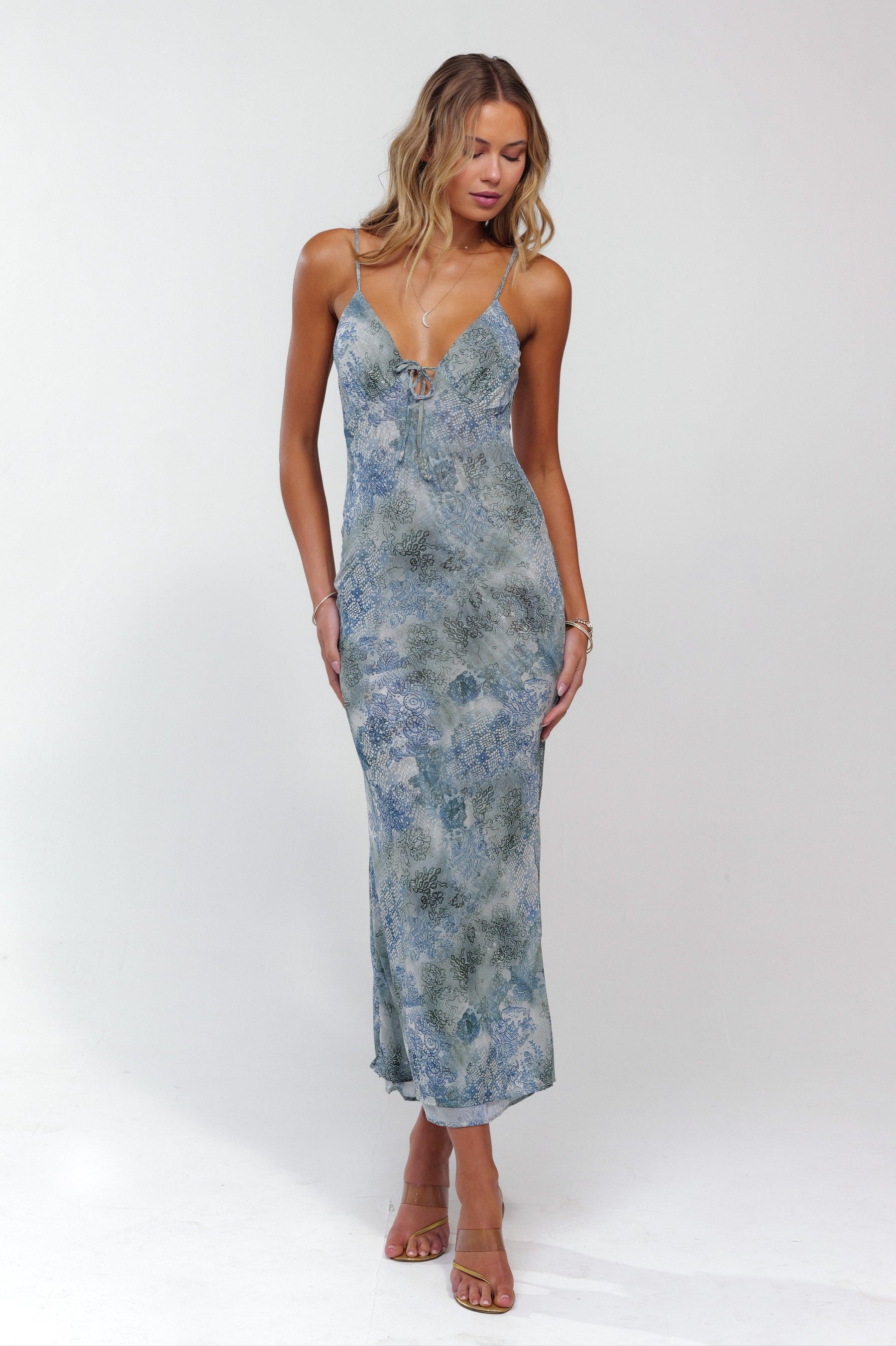 This is an image of Suki Dress in Siren - RESA featuring a model wearing the dress