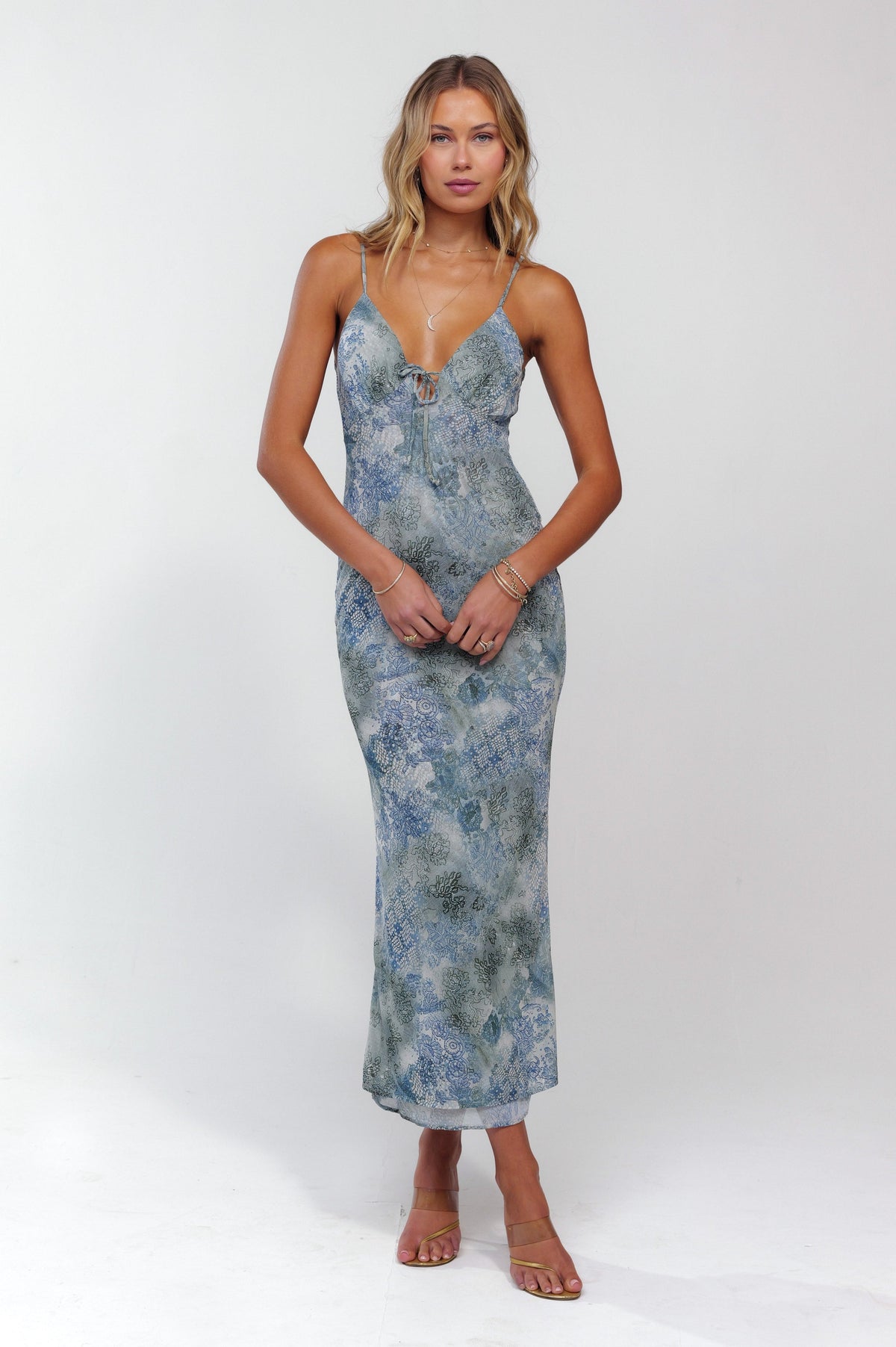 This is an image of Suki Dress in Siren - RESA featuring a model wearing the dress