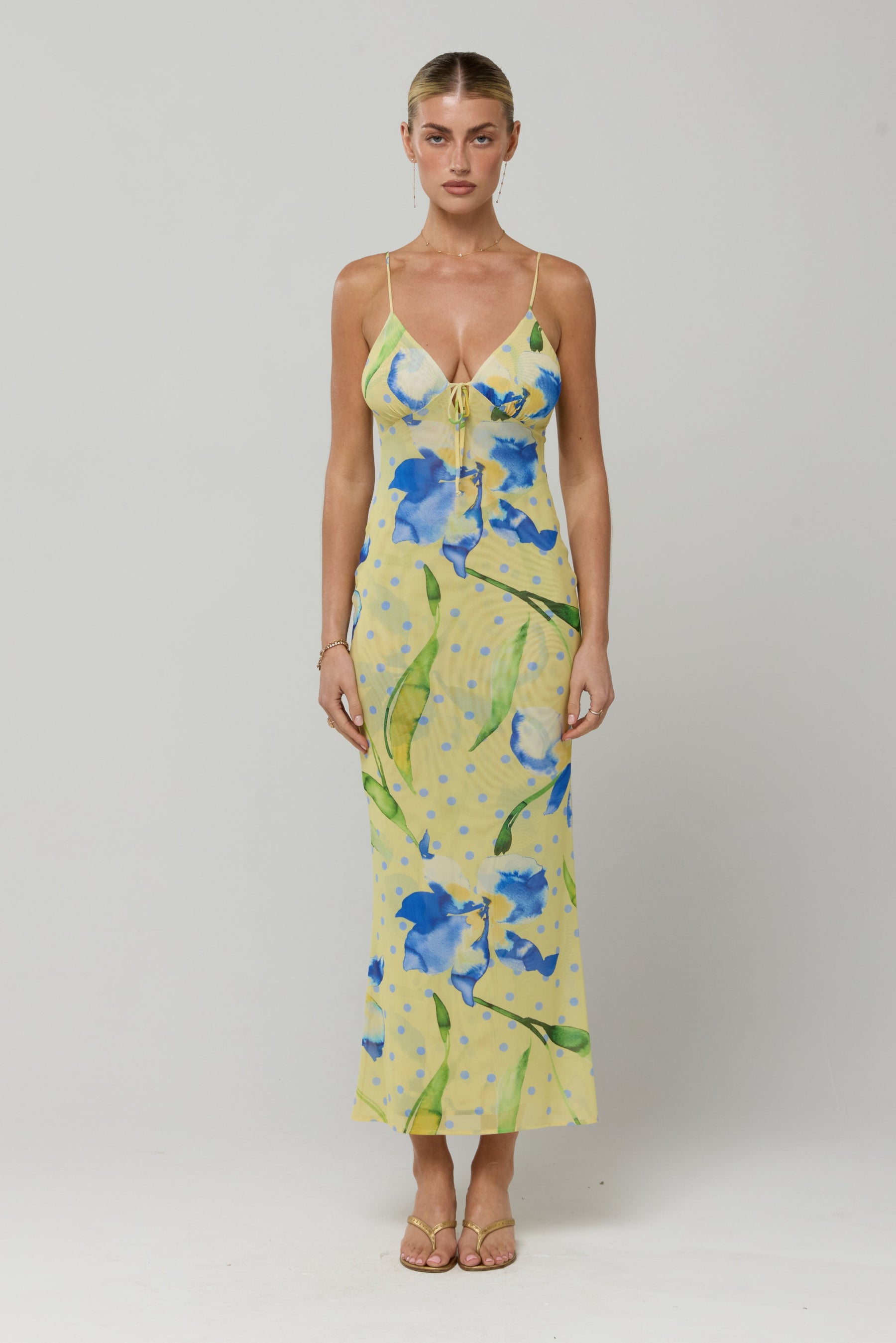 This is an image of Suki Dress in Solei - RESA featuring a model wearing the dress