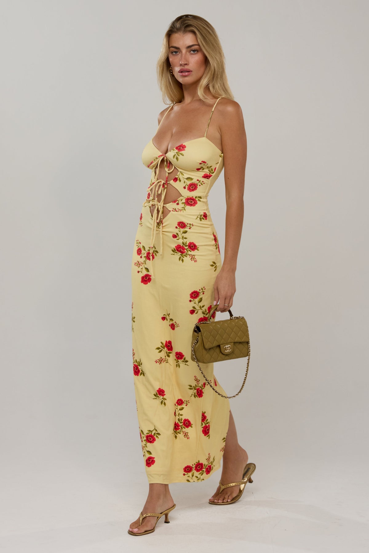 This is an image of Summer knit in Saffron - RESA featuring a model wearing the dress