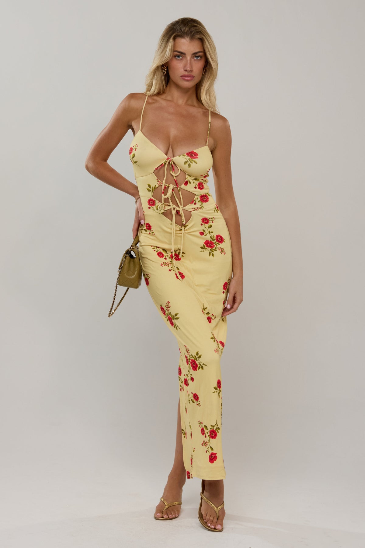 This is an image of Summer knit in Saffron - RESA featuring a model wearing the dress