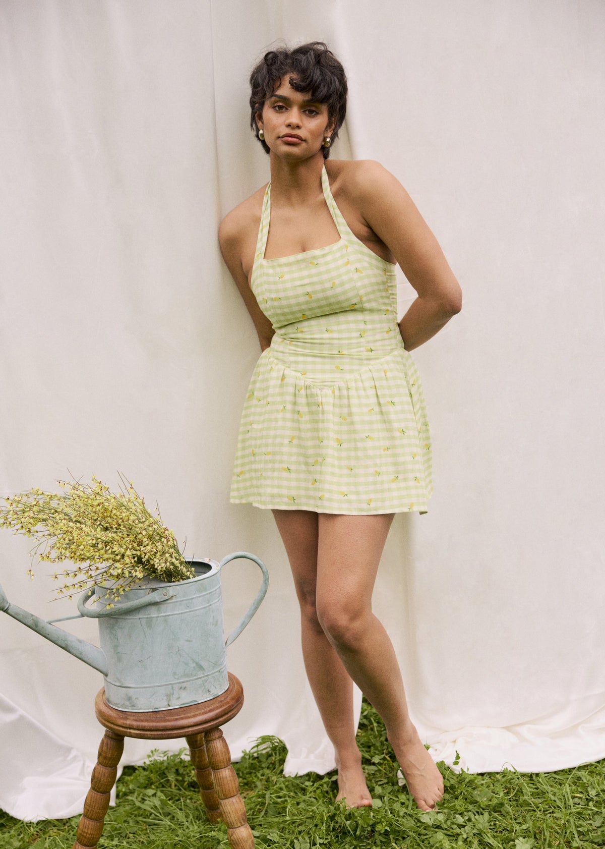 This is an image of Sutton Mini Dress in Zest - RESA featuring a model wearing the dress