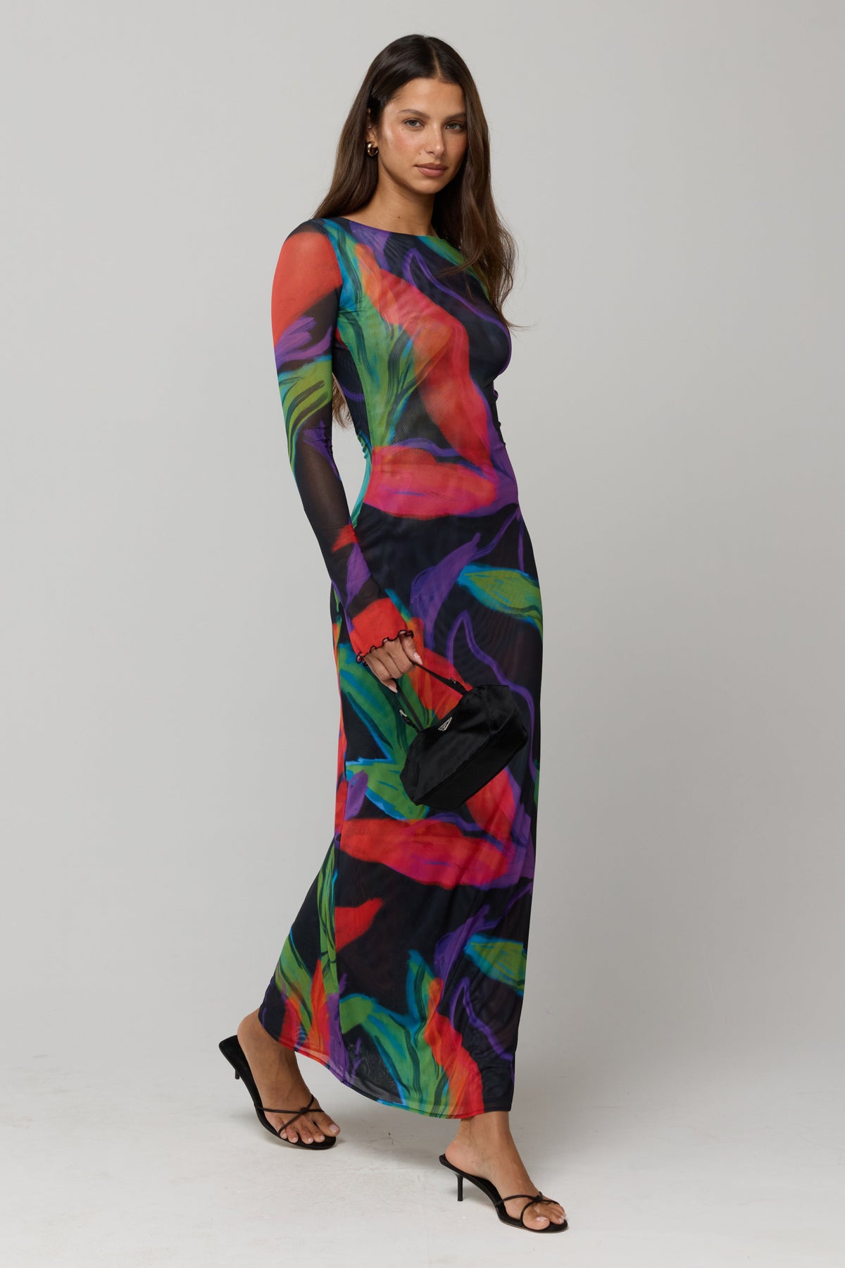 This is an image of Sylvia Dress in Mai Tai - RESA featuring a model wearing the dress