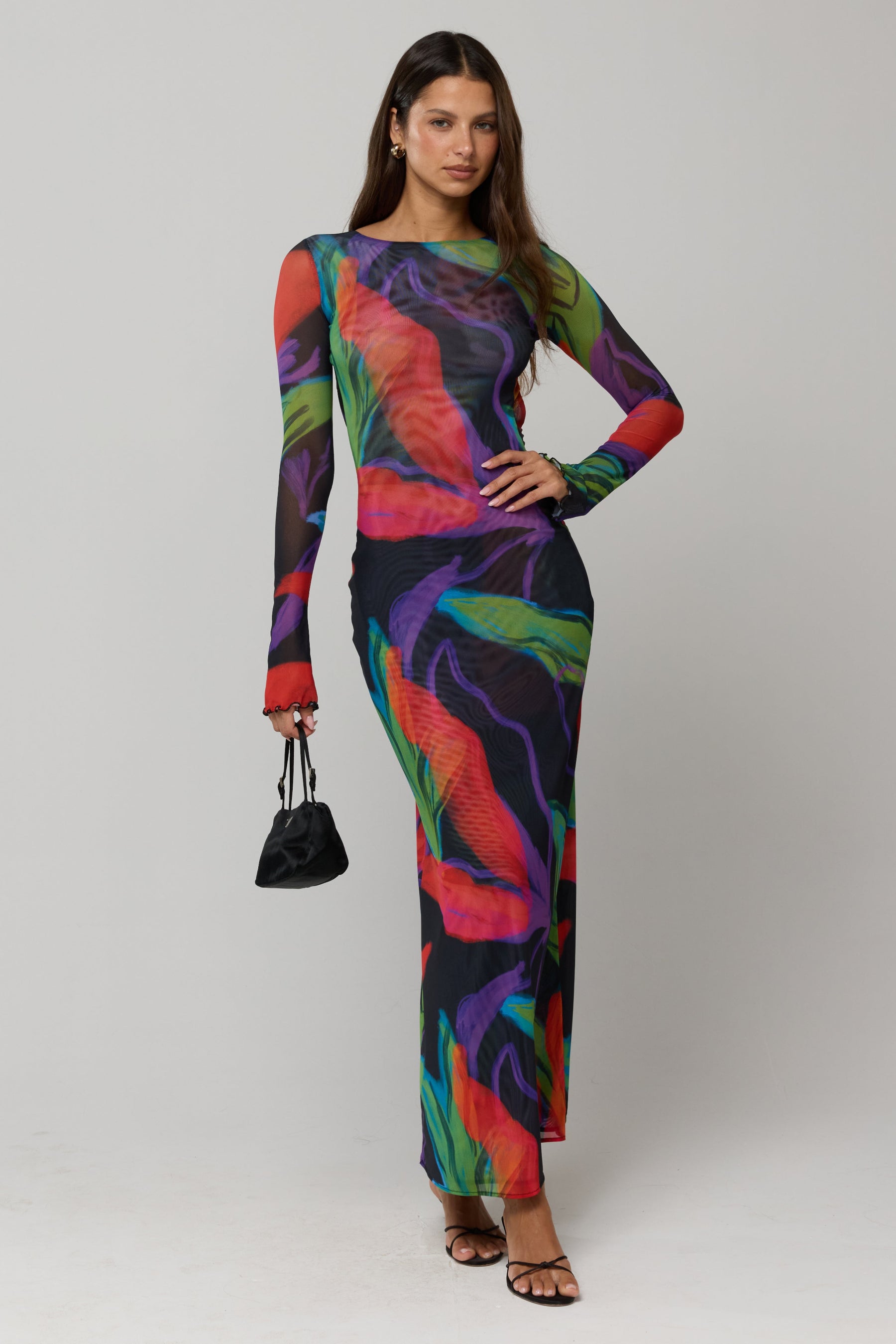 This is an image of Sylvia Dress in Mai Tai - RESA featuring a model wearing the dress
