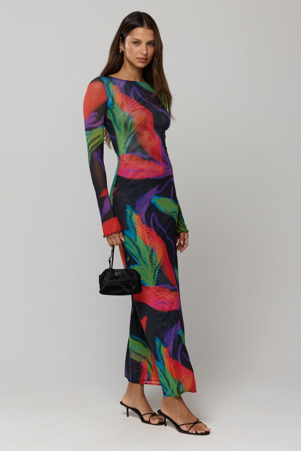 This is an image of Sylvia Dress in Mai Tai - RESA featuring a model wearing the dress