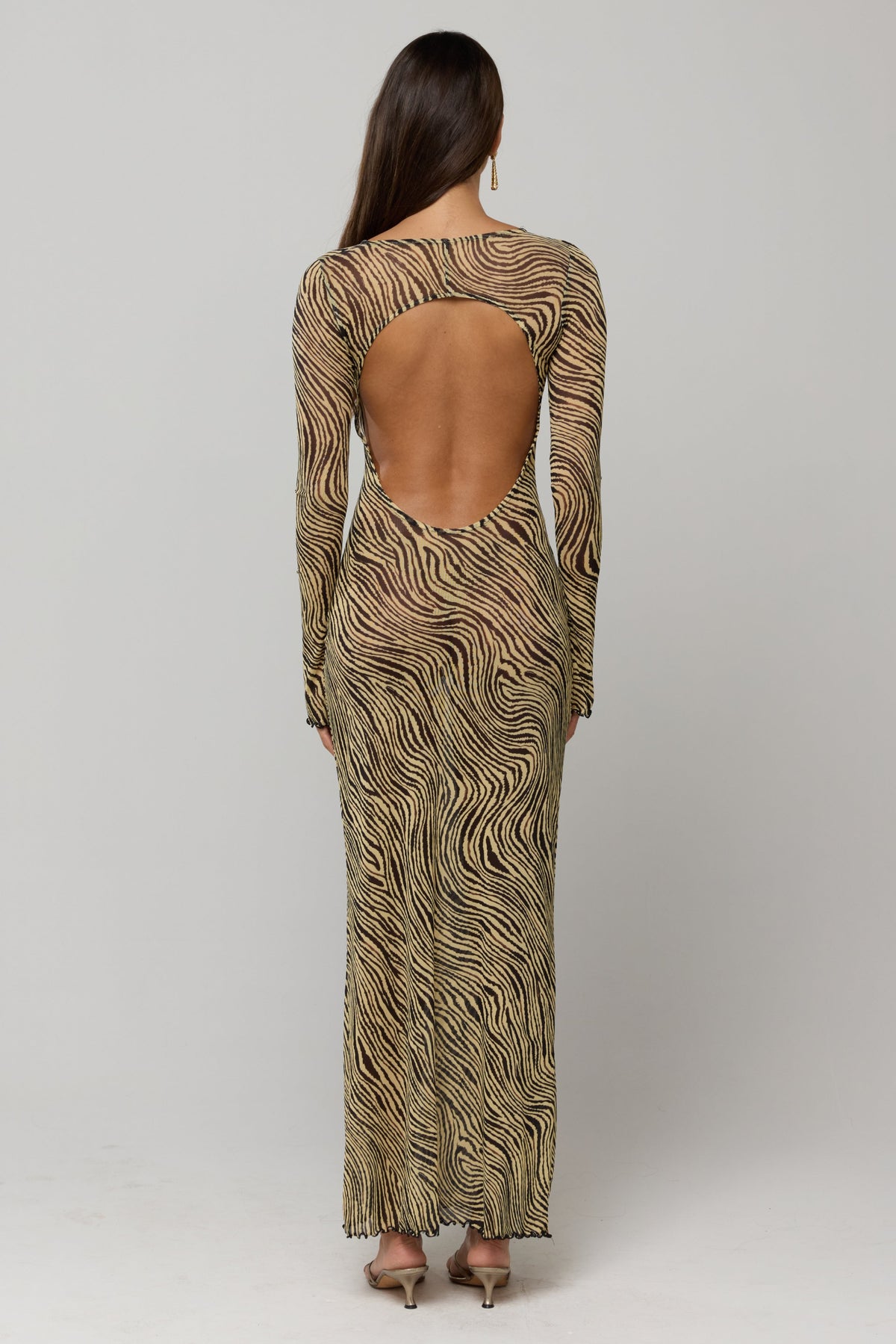This is an image of Sylvia Maxi in Birch - RESA featuring a model wearing the dress