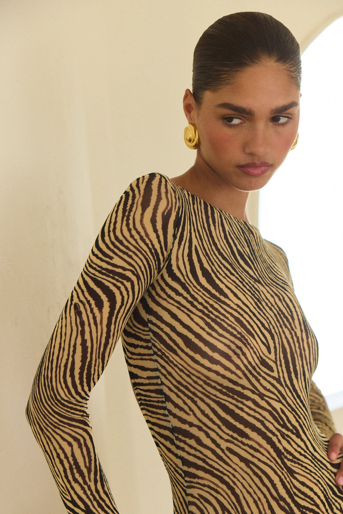 This is an image of Sylvia Maxi in Birch - RESA featuring a model wearing the dress