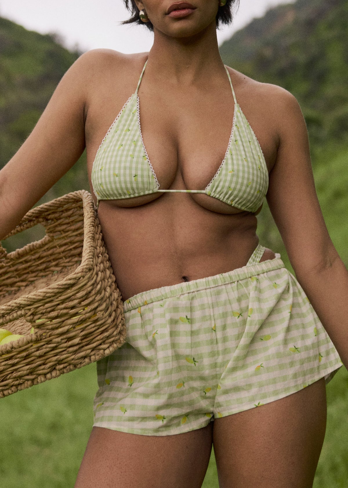 This is an image of Tate Boxer short in Zest - RESA featuring a model wearing the dress