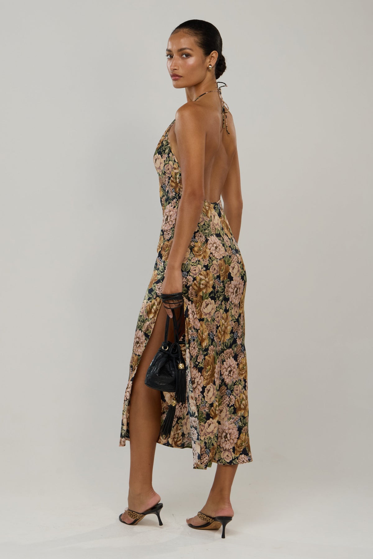 This is an image of Taylor in Antique - RESA featuring a model wearing the dress