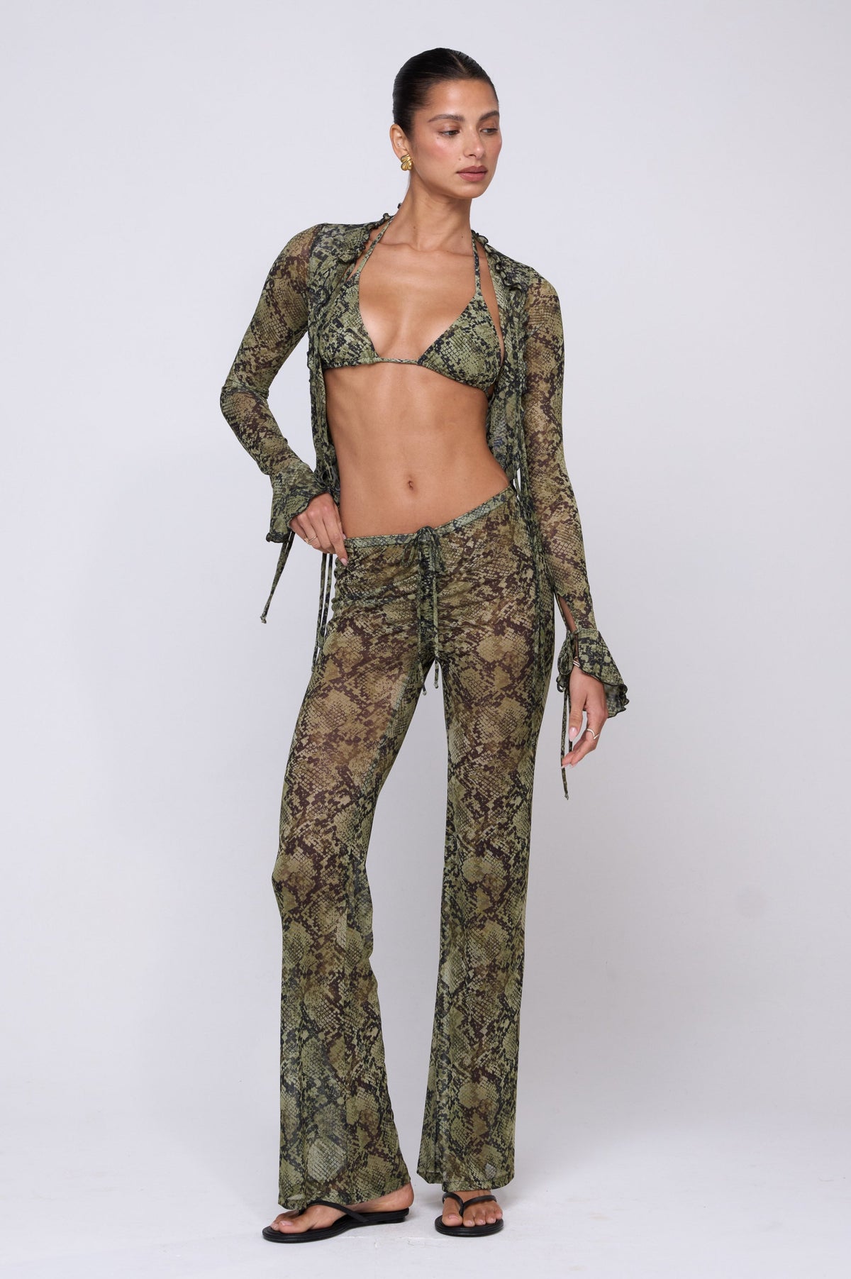 This is an image of Tezza Top in Venom - RESA featuring a model wearing the dress