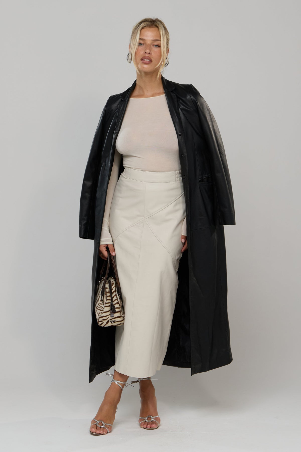 This is an image of Tissue Knit in Cream - RESA featuring a model wearing the dress