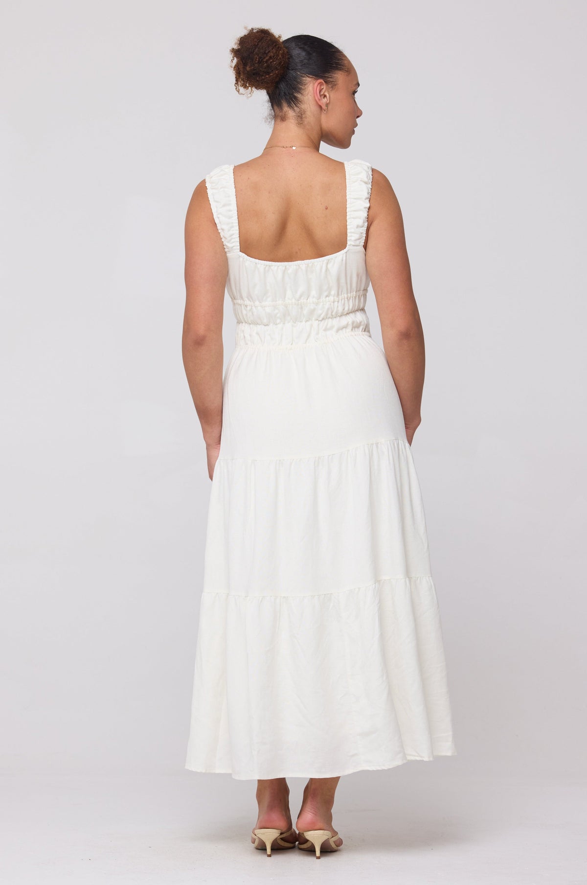 This is an image of Tori Dress in White Linen - RESA featuring a model wearing the dress