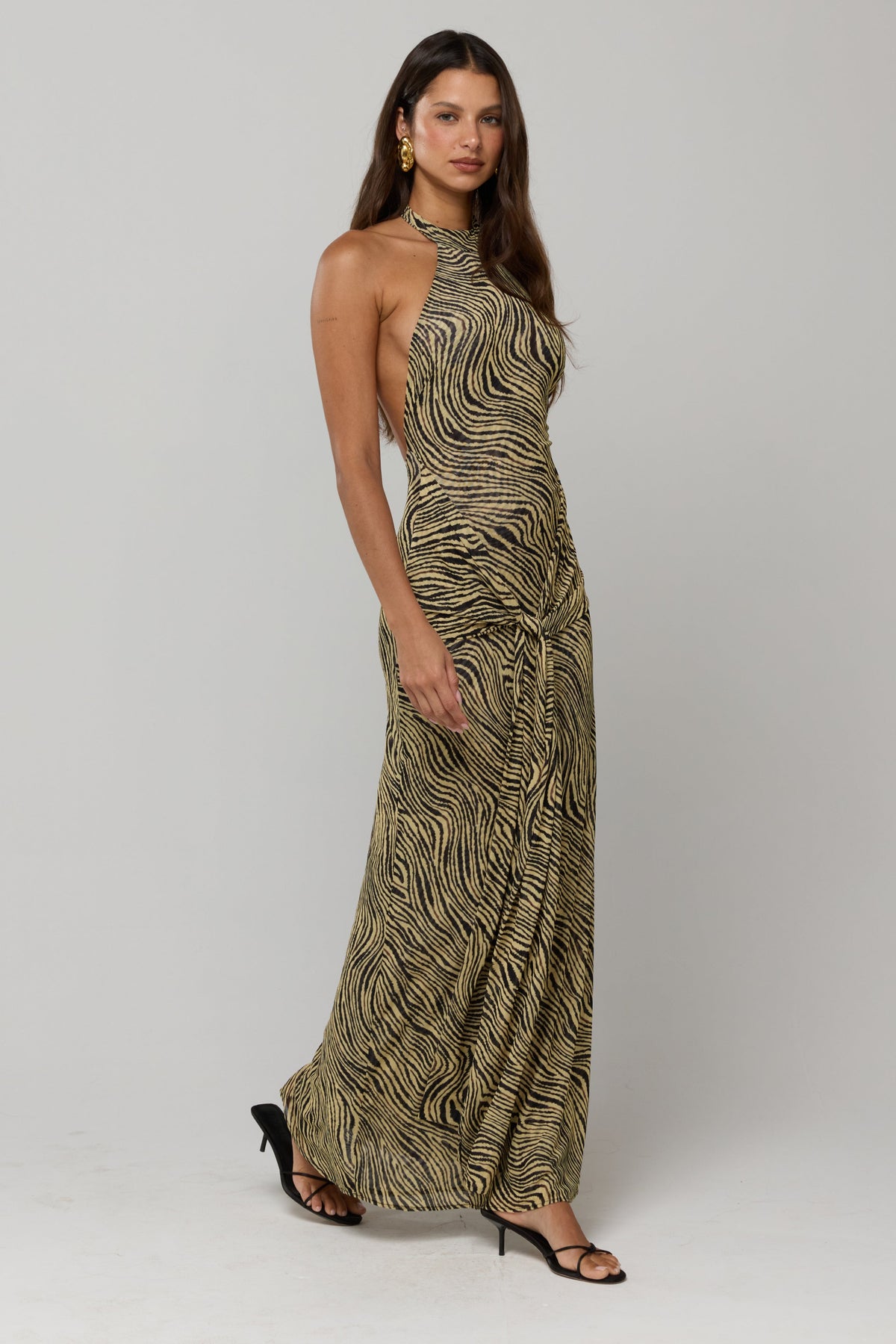 This is an image of Victoria Maxi in Birch - RESA featuring a model wearing the dress