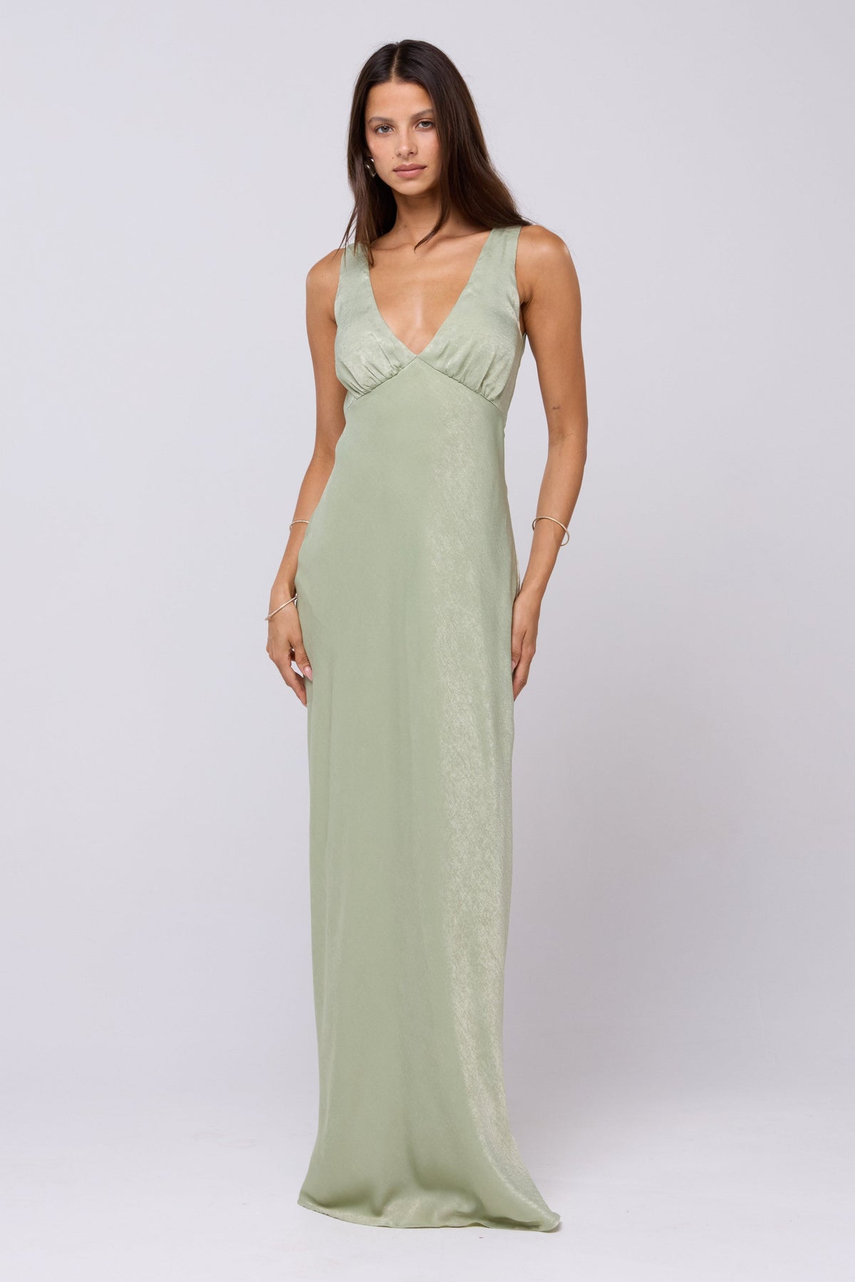 This is an image of Violet Maxi in Sage - RESA featuring a model wearing the dress