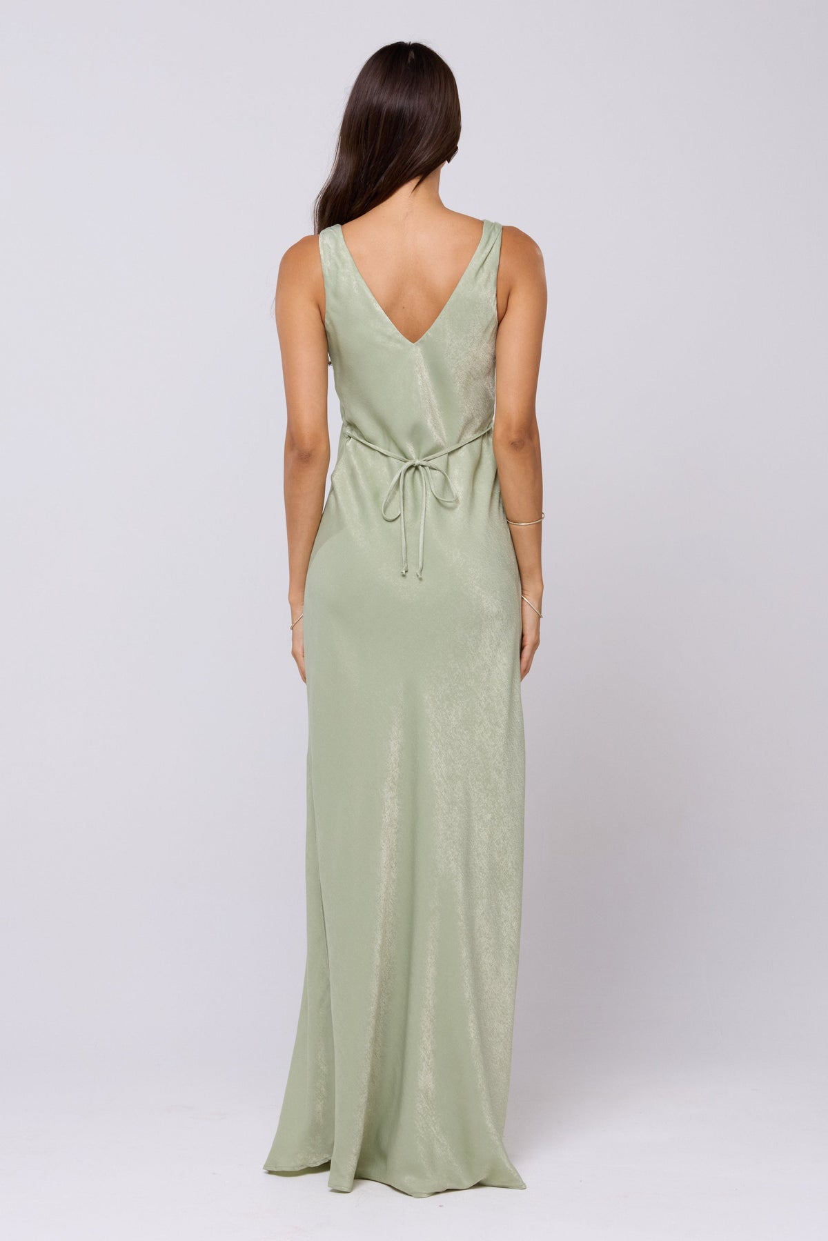 This is an image of Violet Maxi in Sage - RESA featuring a model wearing the dress