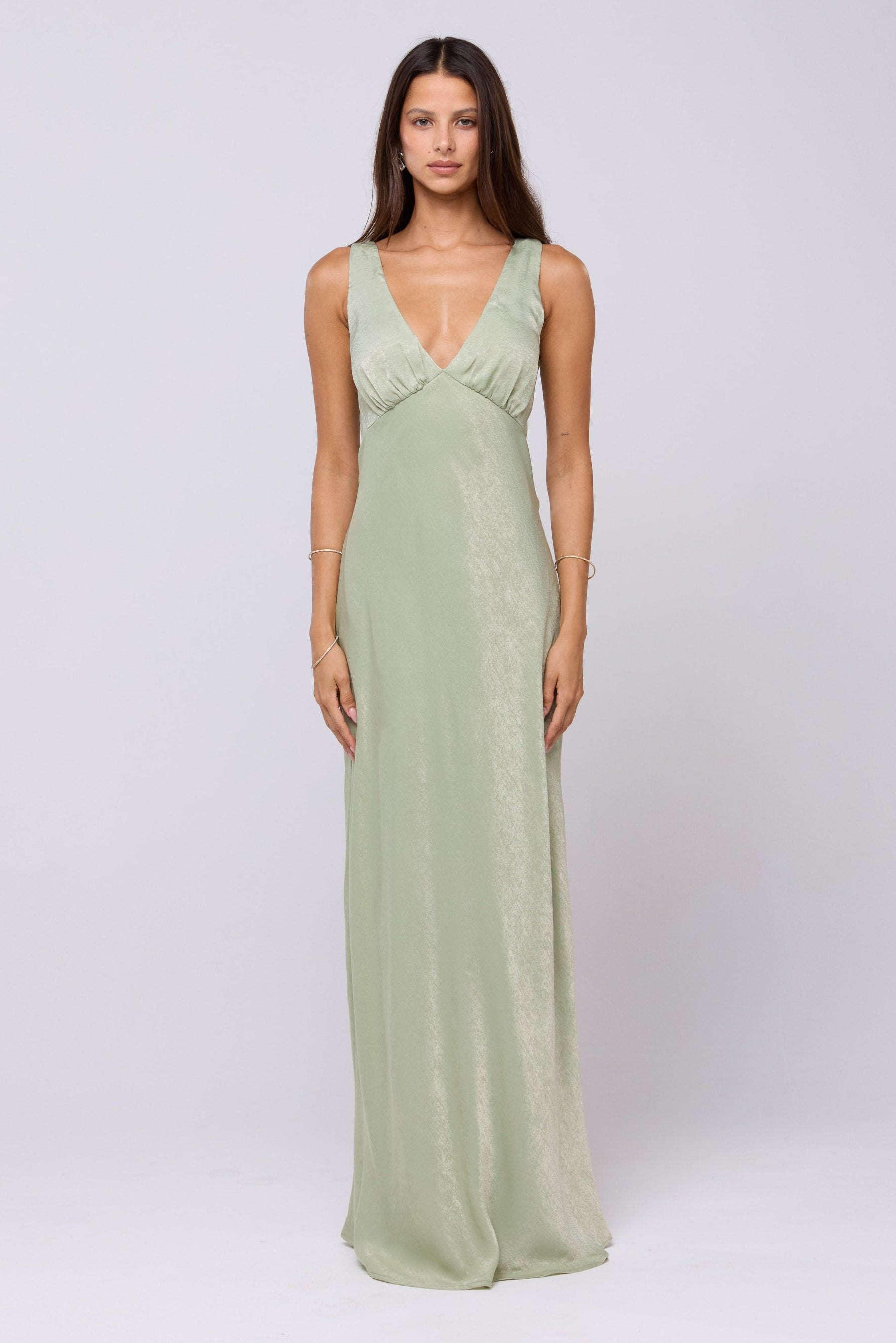 This is an image of Violet Maxi in Sage - RESA featuring a model wearing the dress