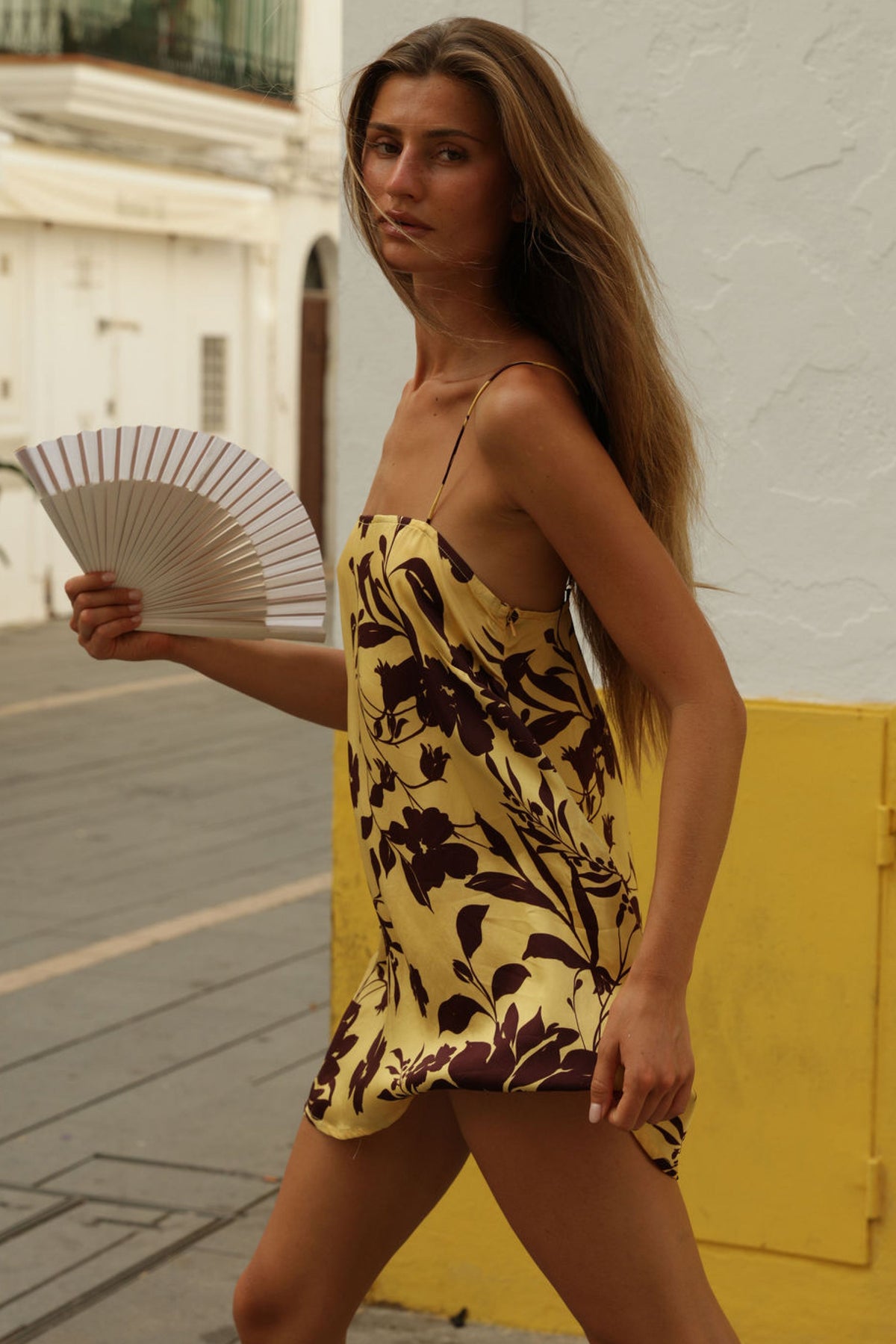 This is an image of Vivi in Mesa - RESA featuring a model wearing the dress