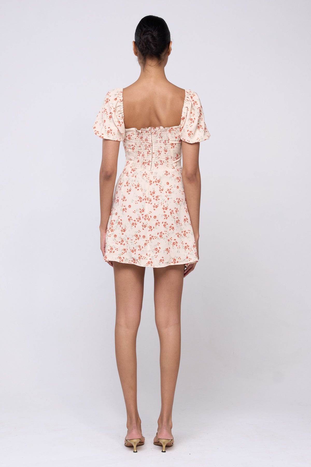 This is an image of Winnie Dress in Wildflower - Archive - RESA featuring a model wearing the dress