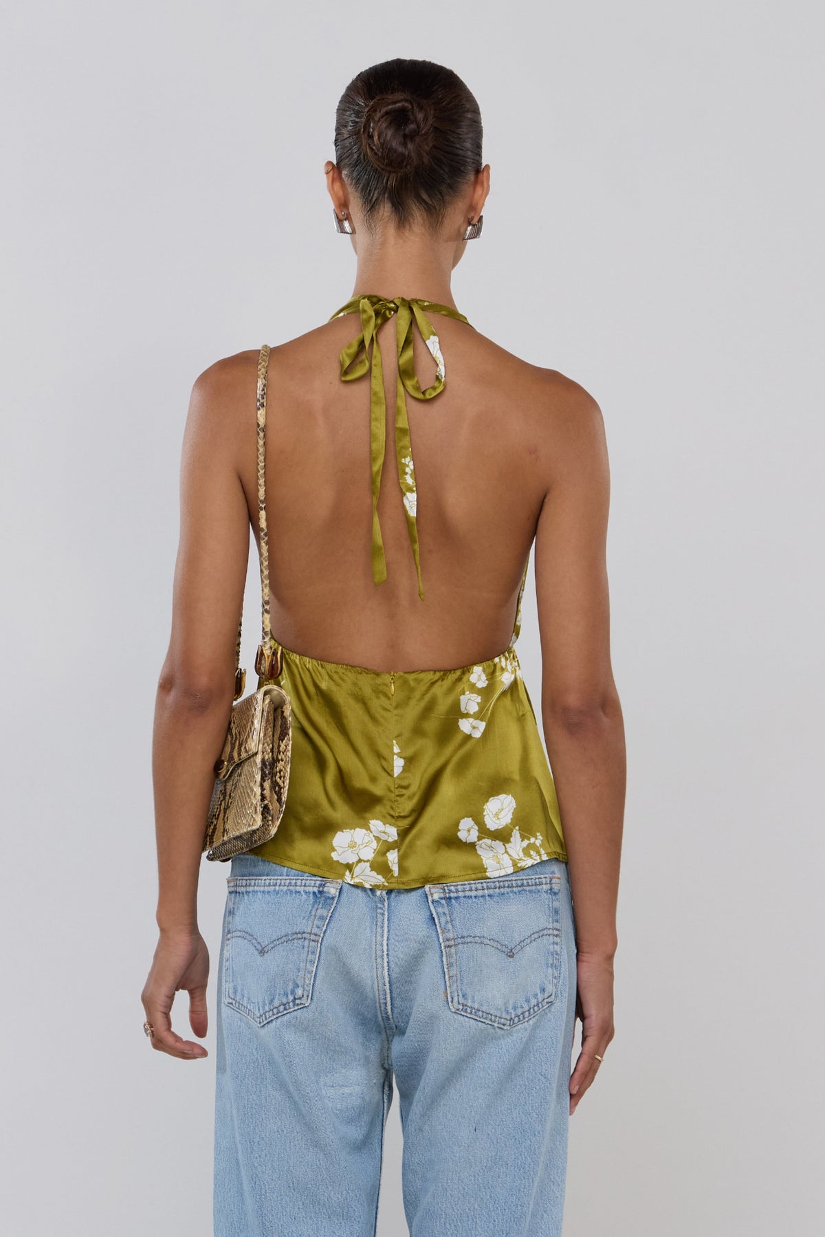 This is an image of Yume in Moss - RESA featuring a model wearing the dress