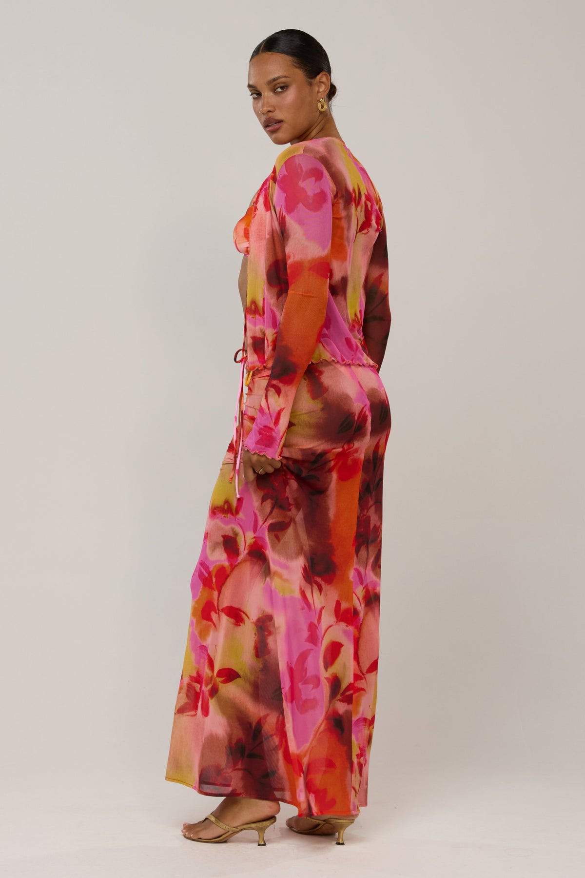 This is an image of Ziggy in Lilikoi - RESA featuring a model wearing the dress