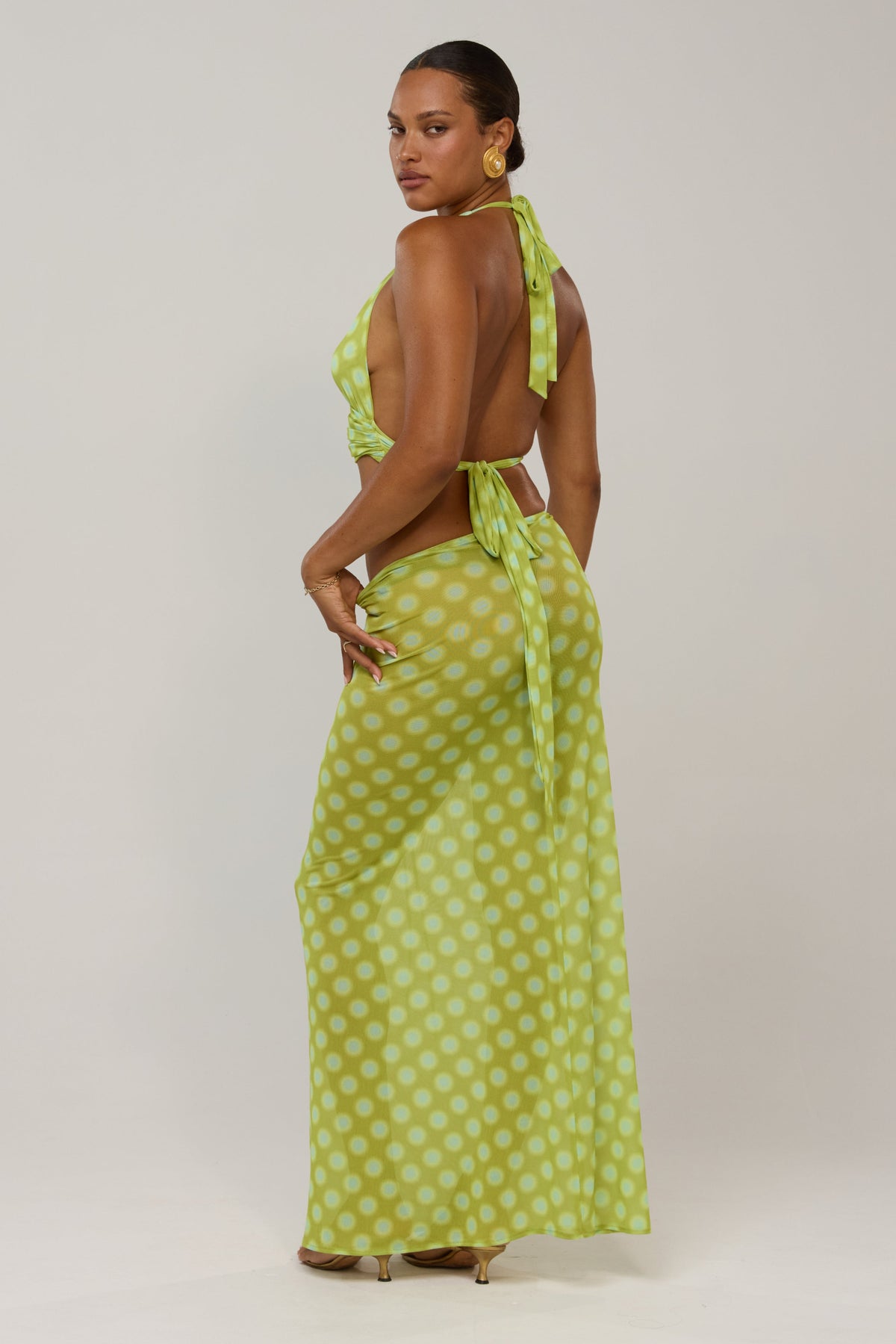 This is an image of Ziggy in Luma - RESA featuring a model wearing the dress