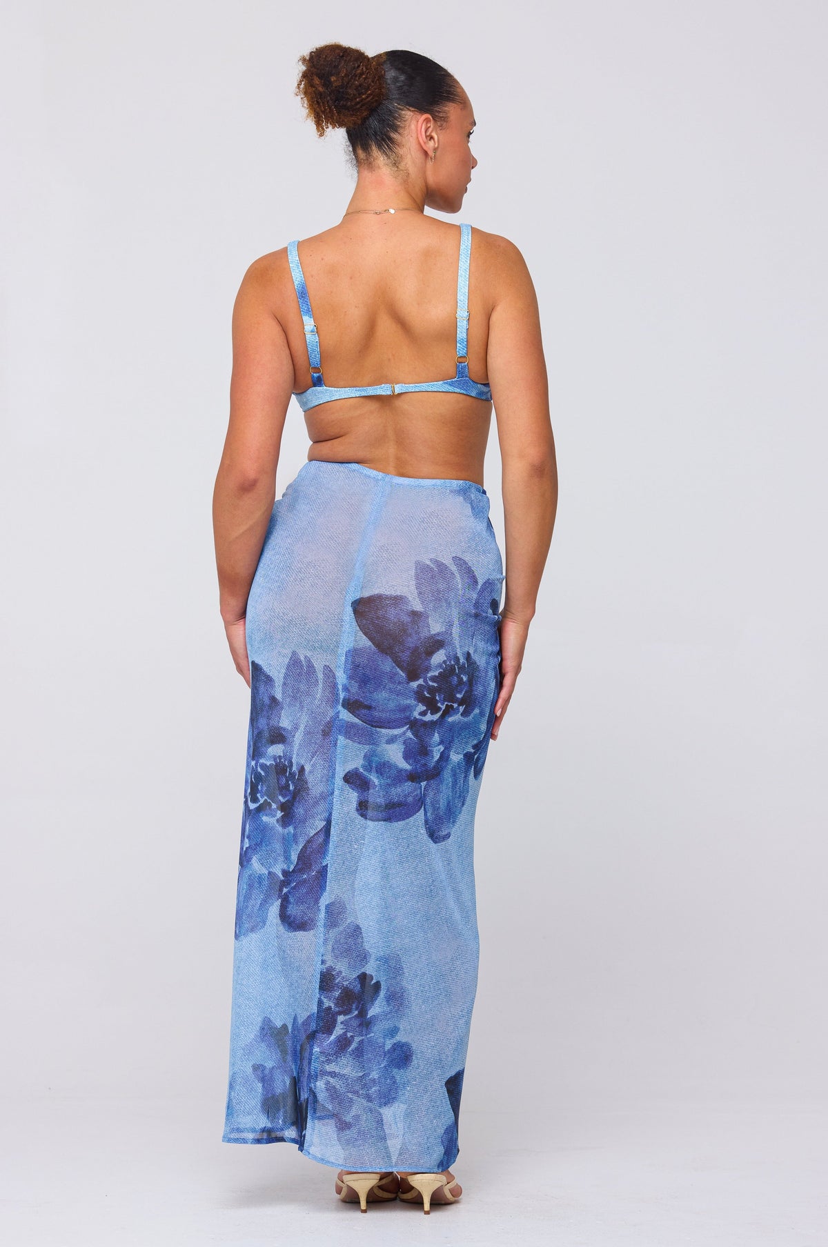 This is an image of Ziggy Mesh Skirt in Indigo - RESA featuring a model wearing the dress