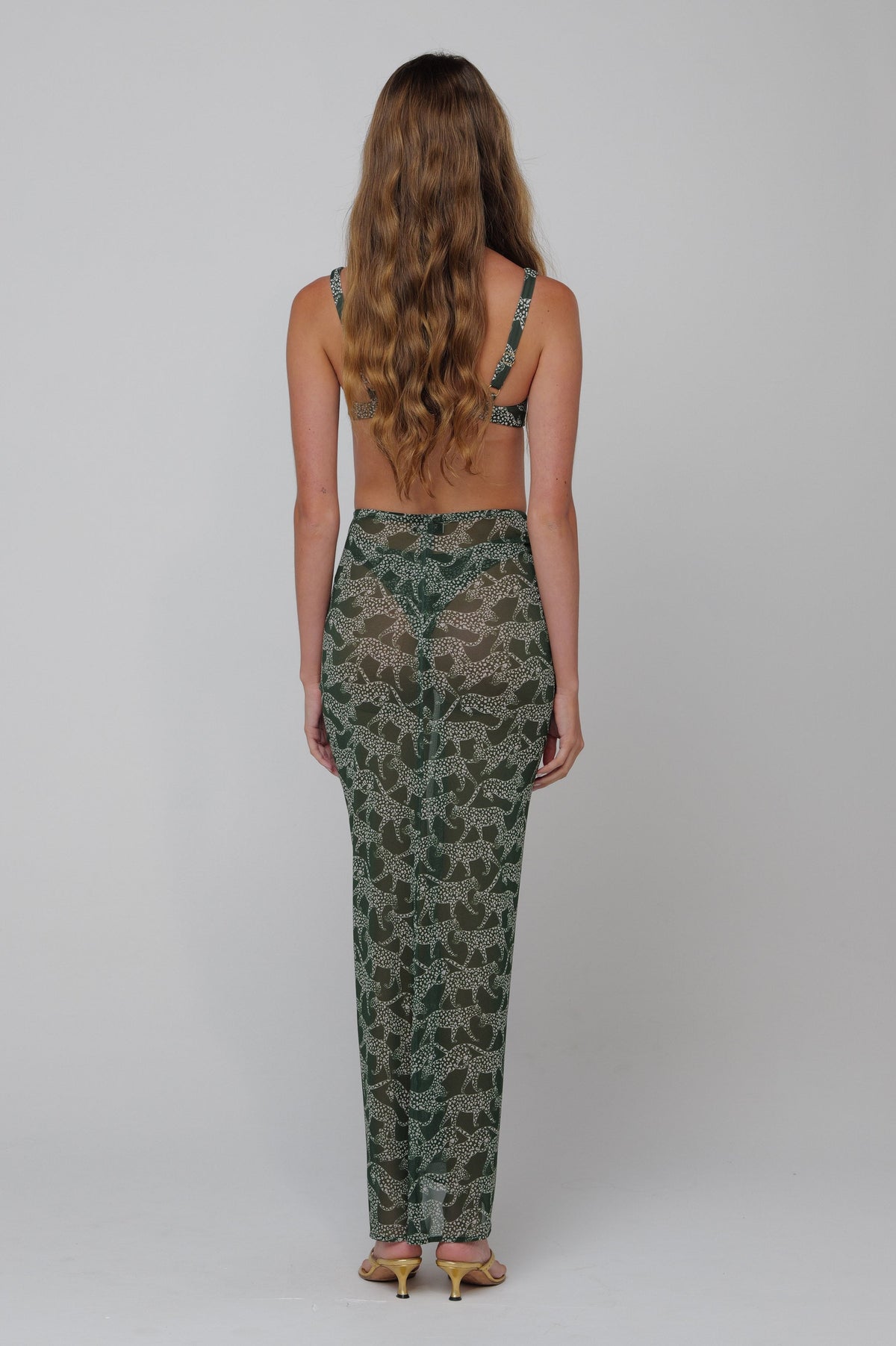 This is an image of Ziggy Mesh Skirt in Puma - RESA featuring a model wearing the dress