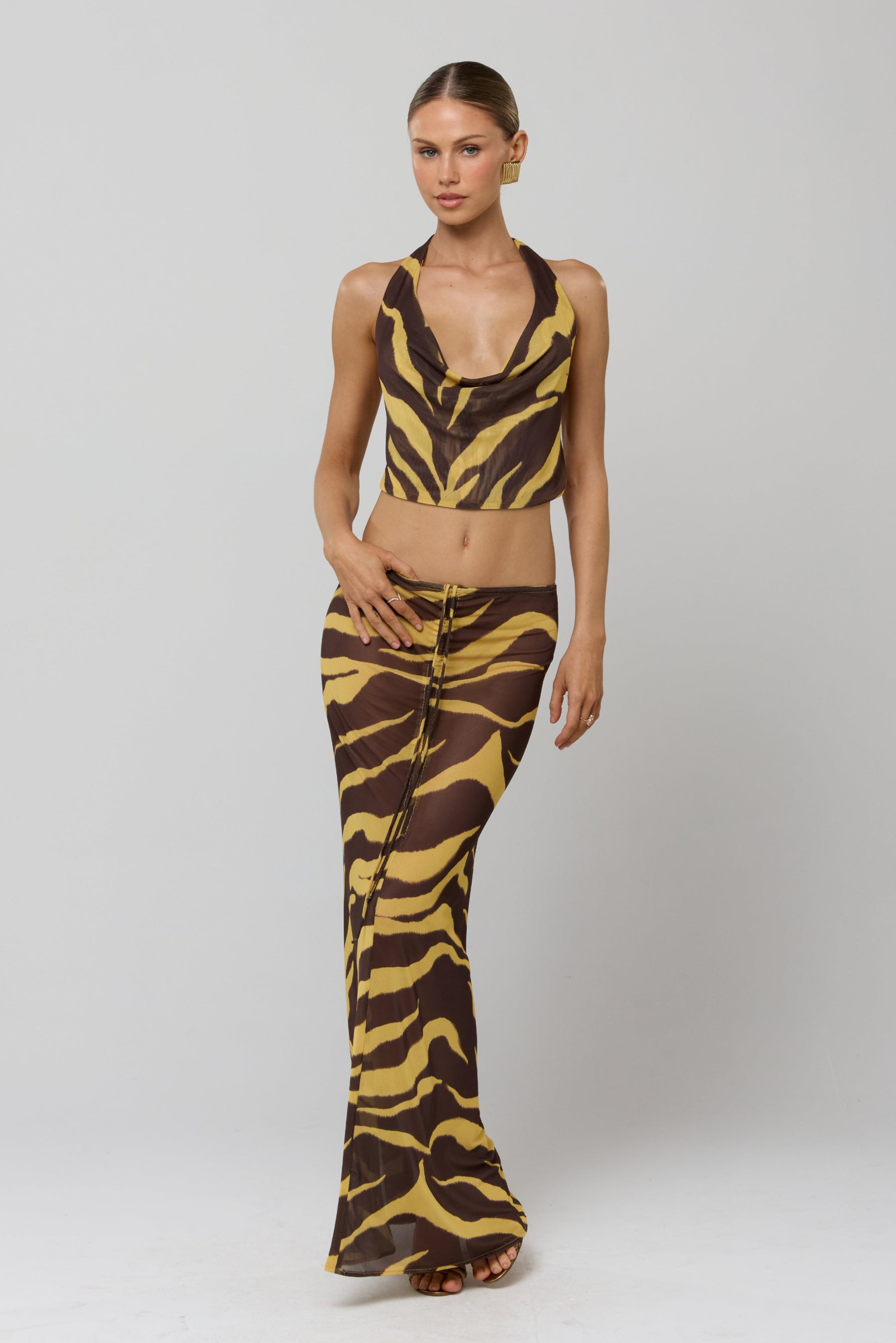 This is an image of Ziggy Mesh Skirt in Raja - RESA featuring a model wearing the dress