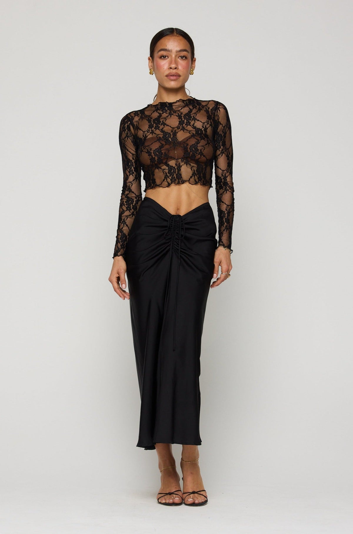 This is an image of Ziggy Skirt in Black - RESA featuring a model wearing the dress
