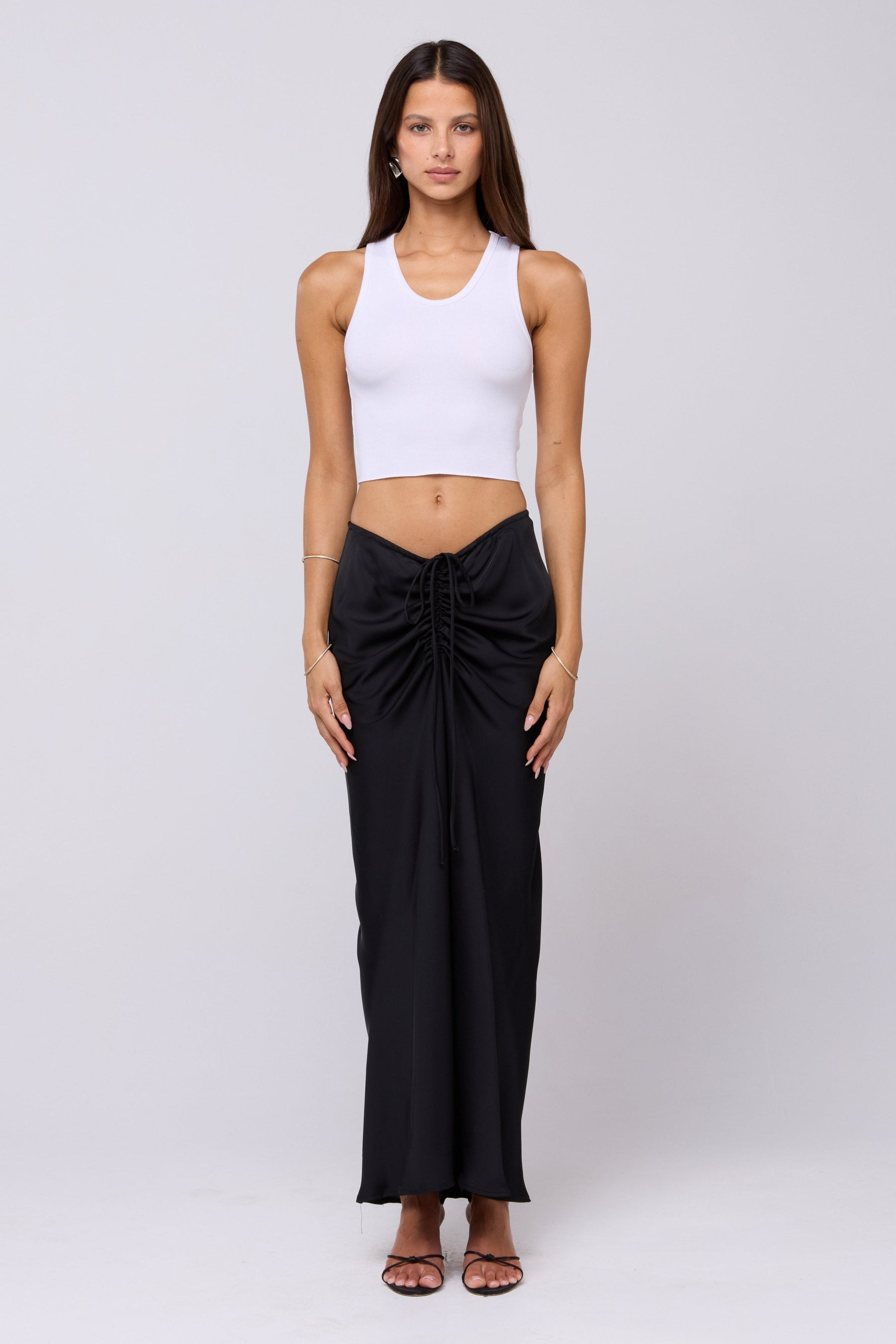 This is an image of Ziggy Skirt in Black - RESA featuring a model wearing the dress