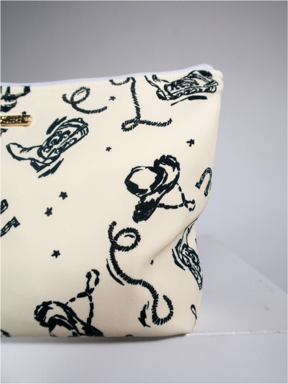 This is an image of Zipper Pouch Big Sky - RESA featuring a model wearing the dress