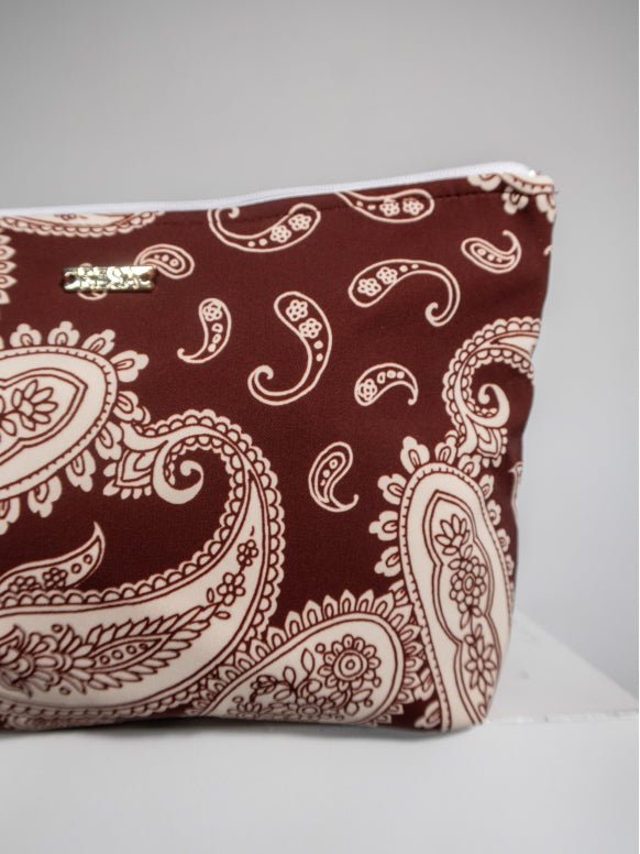 This is an image of Zipper Pouch Bronco - RESA featuring a model wearing the dress