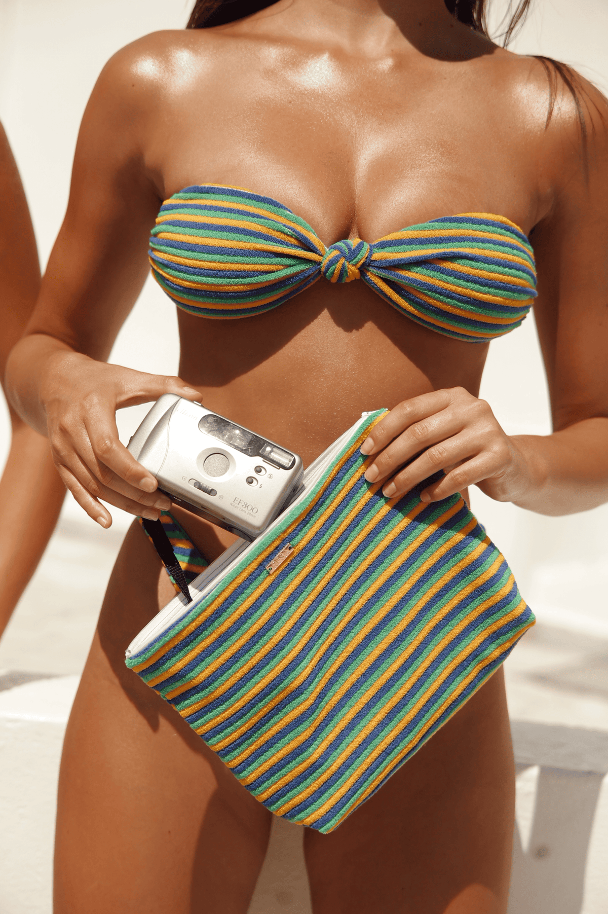 This is an image of Zipper Pouch in Rio - RESA featuring a model wearing the dress