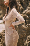 This is an image of Aisha Dress in Natural - RESA featuring a model wearing the dress