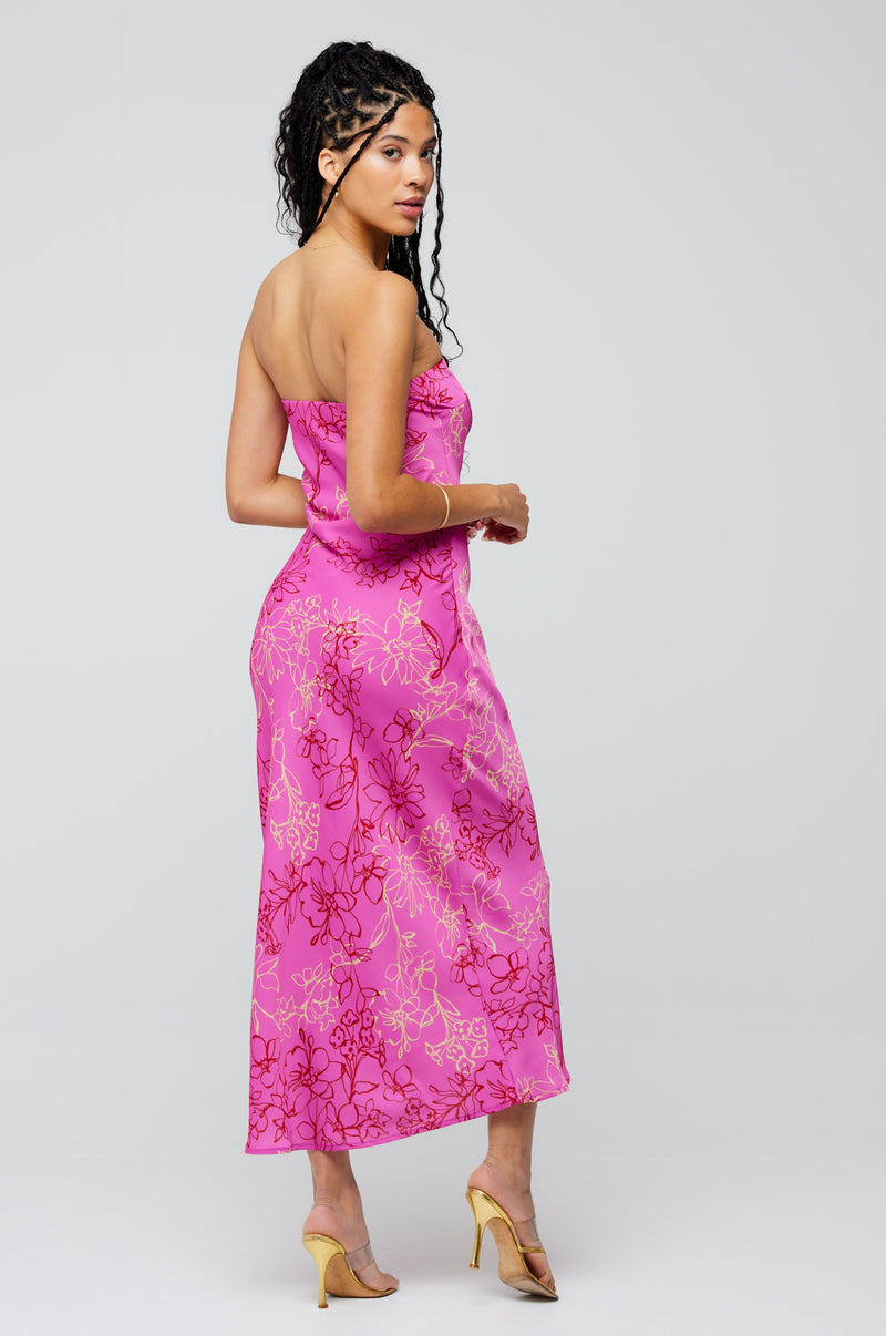 This is an image of Anna Slip in Azalea - RESA featuring a model wearing the dress