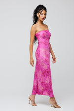 This is an image of Anna Slip in Azalea - RESA featuring a model wearing the dress