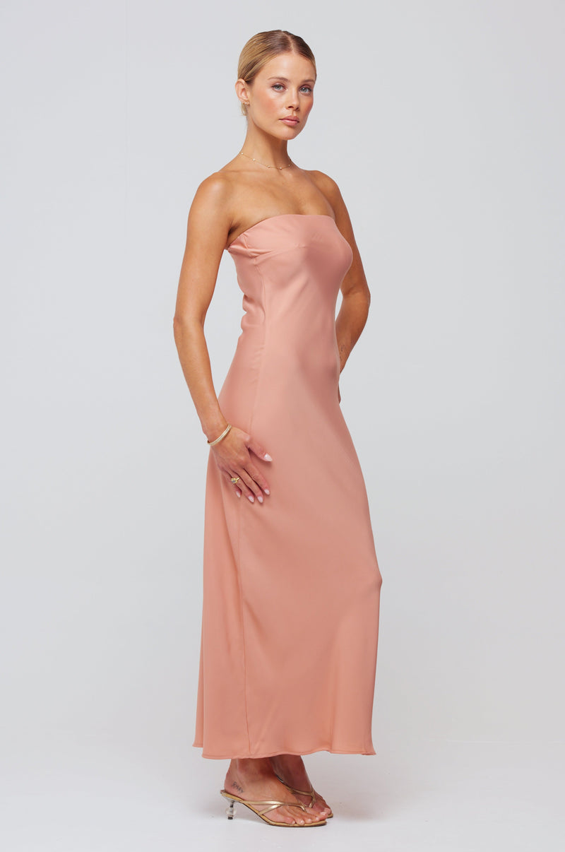 This is an image of Anna Slip in Blush - RESA featuring a model wearing the dress