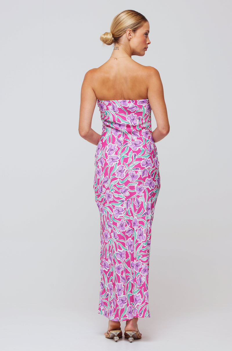 This is an image of Anna Slip in Hibiscus - RESA featuring a model wearing the dress