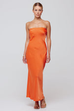 This is an image of Anna Slip in Papaya - RESA featuring a model wearing the dress