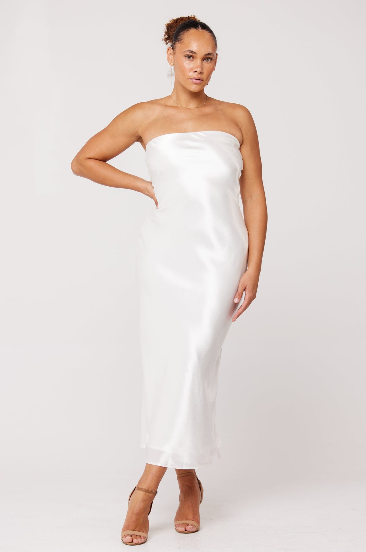 This is an image of Anna Slip in Pearl - RESA featuring a model wearing the dress