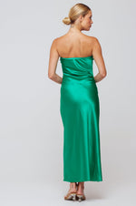 This is an image of Anna Slip in Verde - RESA featuring a model wearing the dress
