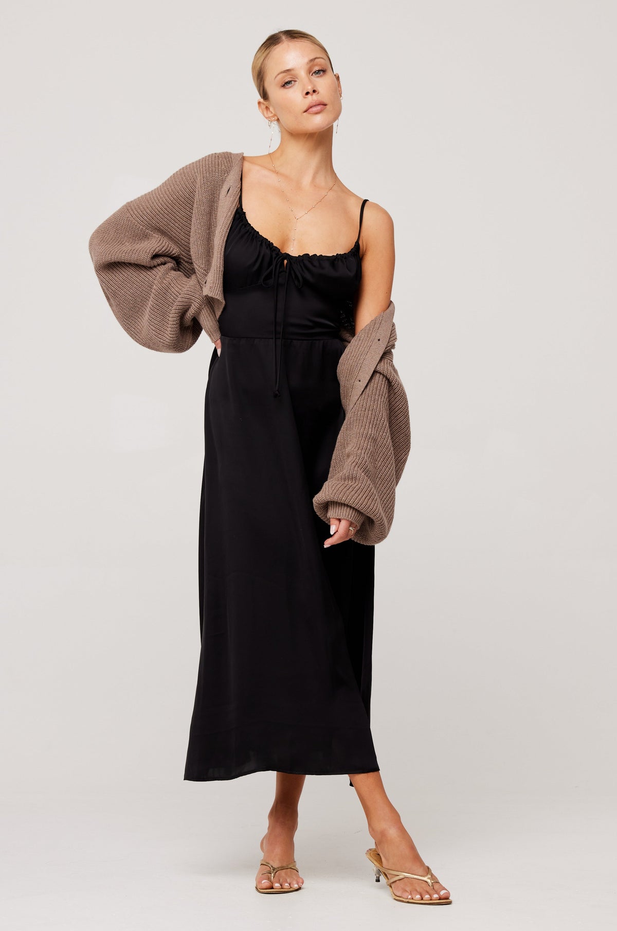 This is an image of Annette Cardigan in Chai - RESA featuring a model wearing the dress