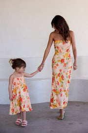 This is an image of Ashley Kids in Ginger - RESA featuring a model wearing the dress