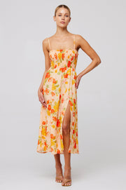 This is an image of Ashley Midi in Ginger - RESA featuring a model wearing the dress
